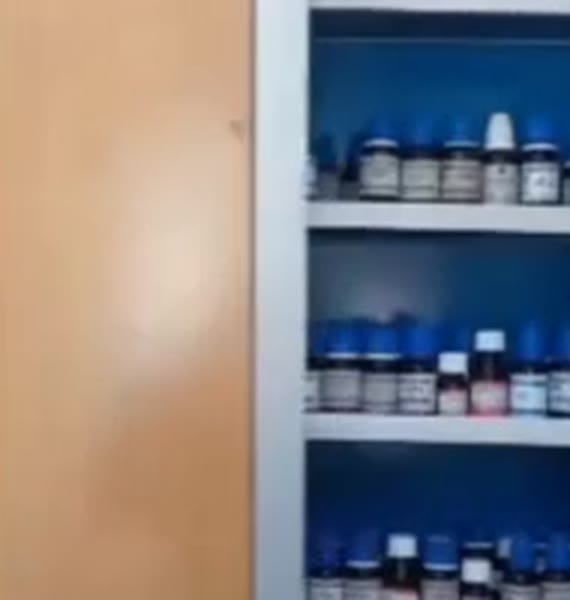 Shelves of homeopathic medicines at the clinic